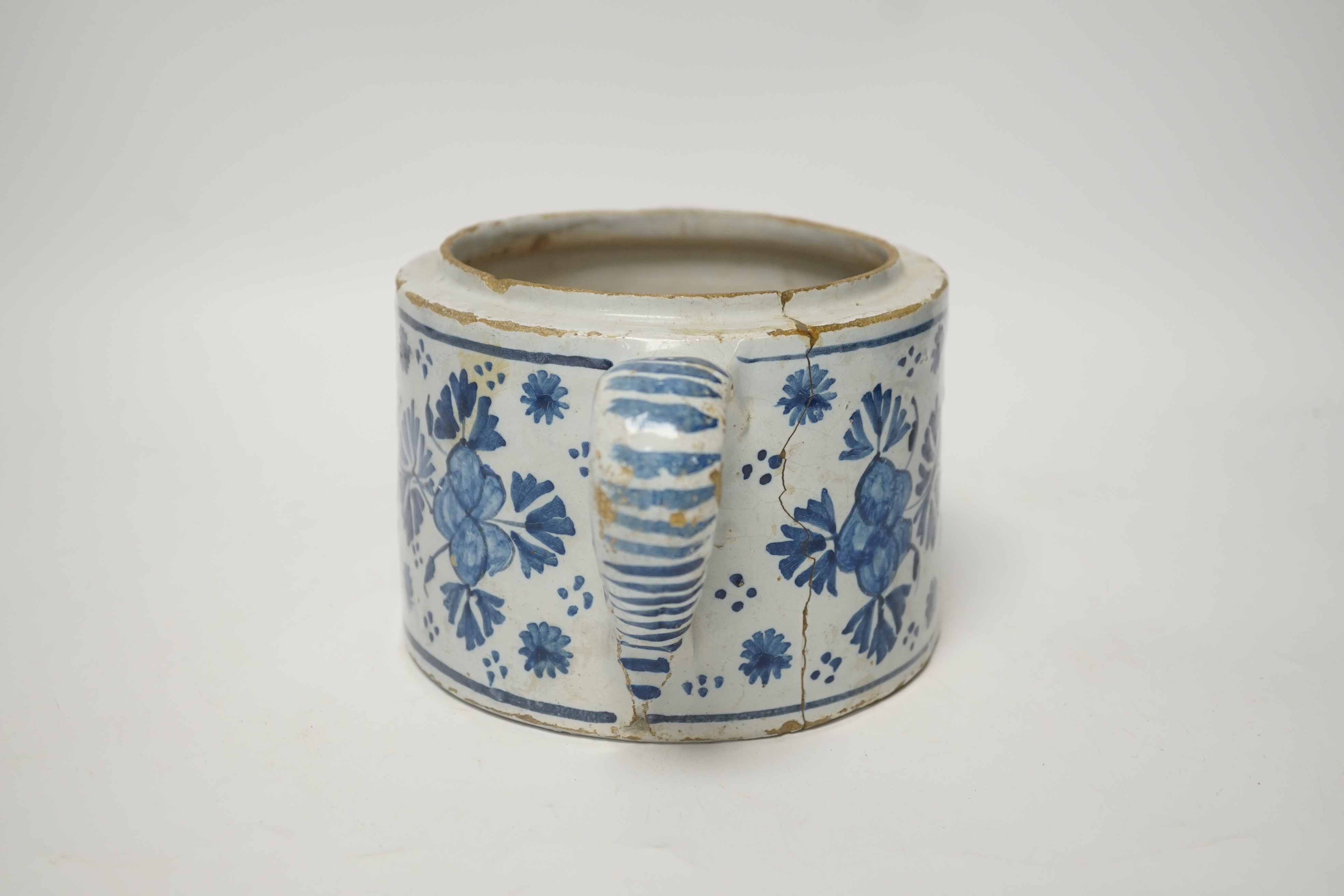 A Delft two handled posset pot, c.1680-1700, 23cm wide including handles